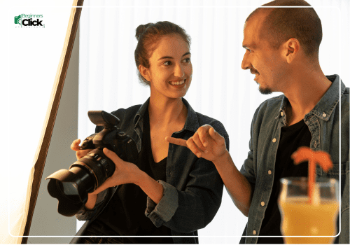Collaborative Photography Learning Experience Learning photography from scratch – A woman and a man discussing photography while holding a DSLR camera.
